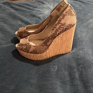 Vince Camuto, bamboo platform heels with snakeskin print. Size 6